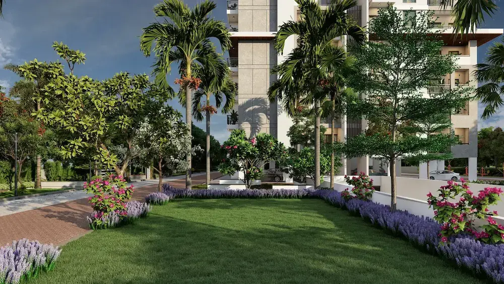 A lawn edged with lavender, roses and palms at the foot of the towers.