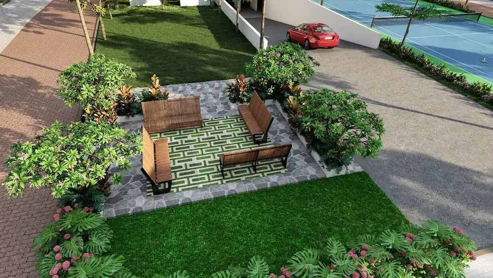Timber benches on a patterned stone sit-out in a garden, a tennis court and the drive beyond.